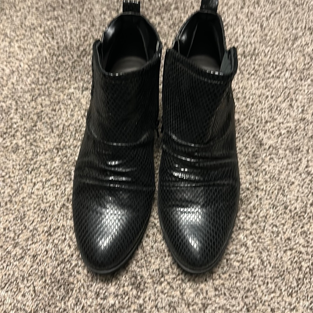 Women’s black ankle boot.